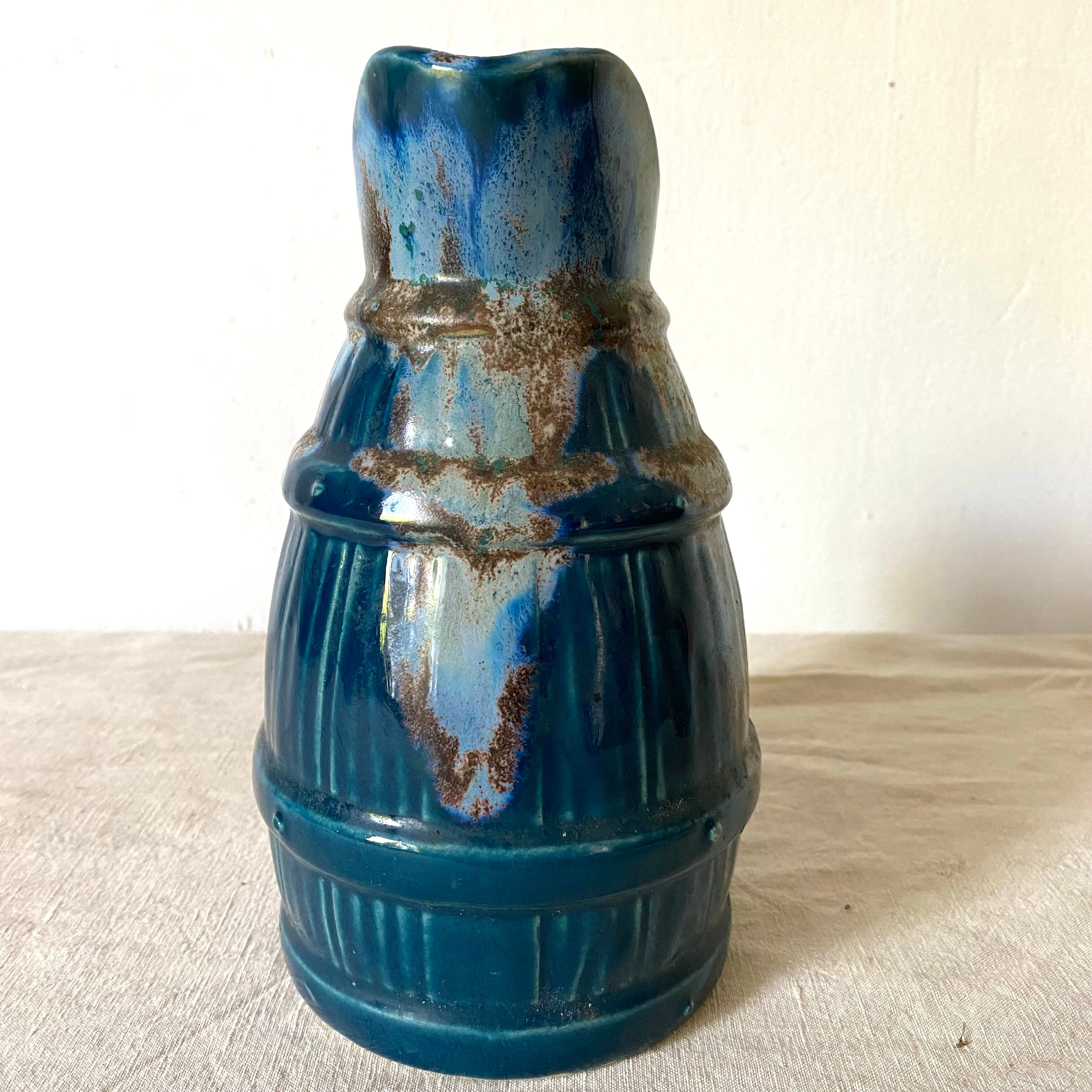 Blue barrel ceramic pitcher