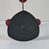 Red metal chandelier for three candles