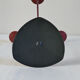 Red metal chandelier for three candles