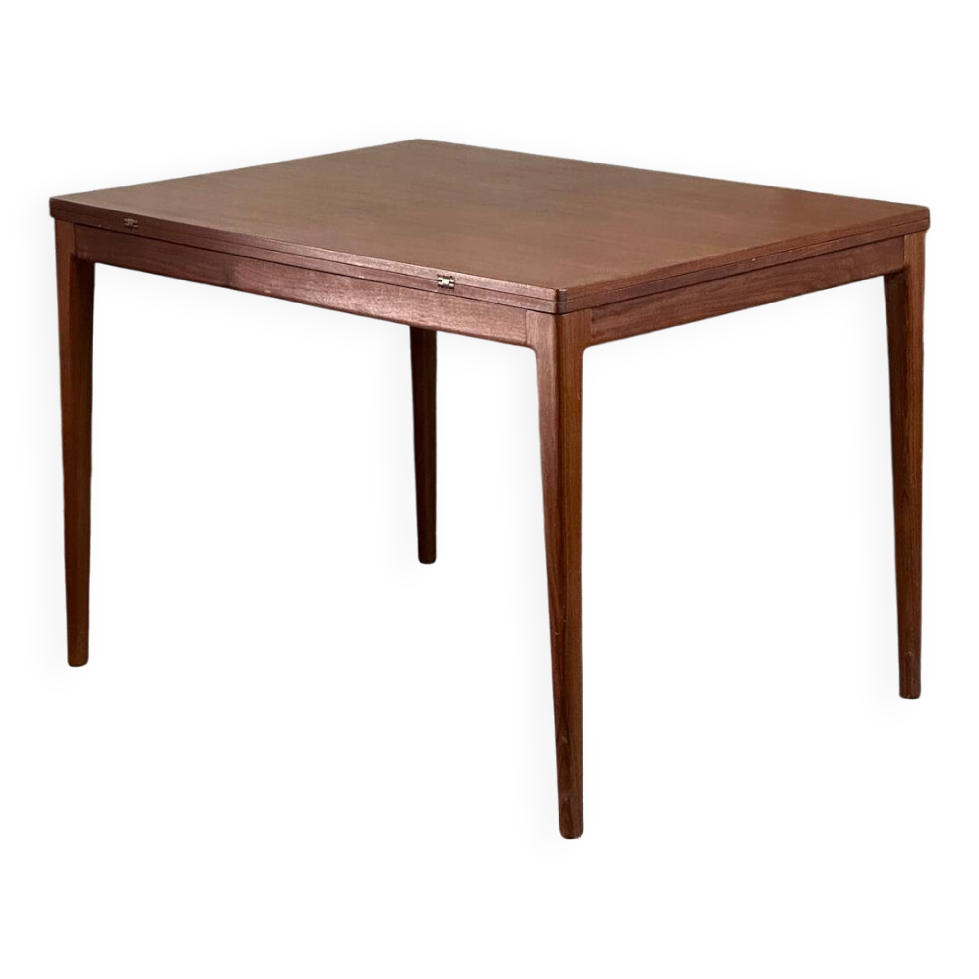 Extendable teak and teak veneer dining table