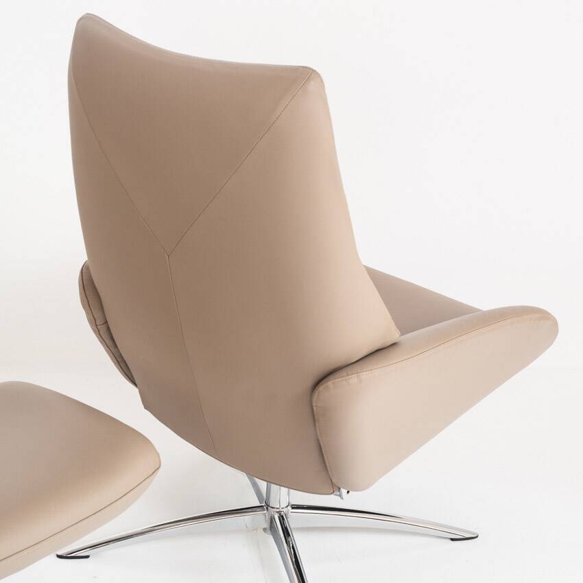 Leather armchair with footstool. Lotus model. Manufacturer: Kebe. Denmark