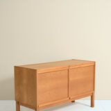 Oak sideboard with retractable doors