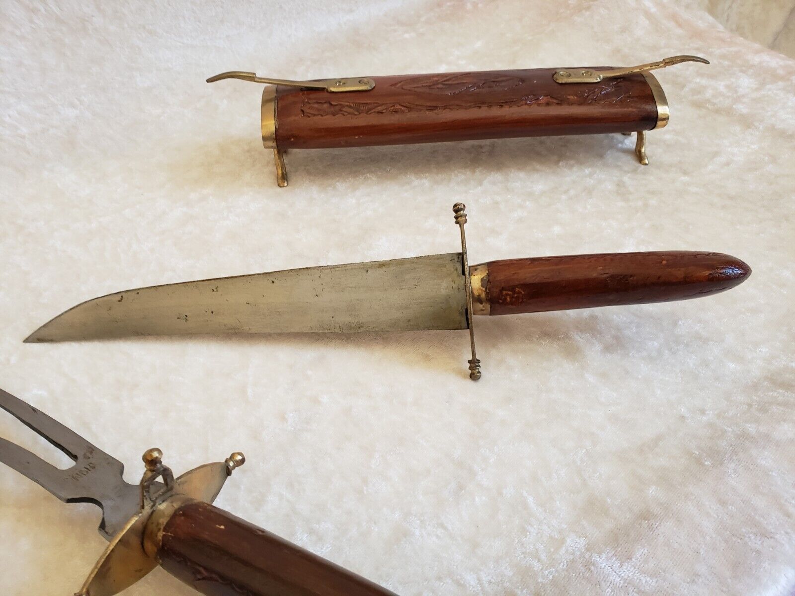 Vintage cutting service with knife and fork in wooden sheath