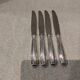 4 table knives with silver-plated metal handles, silversmith Christofle Malmaison