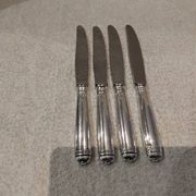 4 table knives with silver-plated metal handles, silversmith Christofle Malmaison