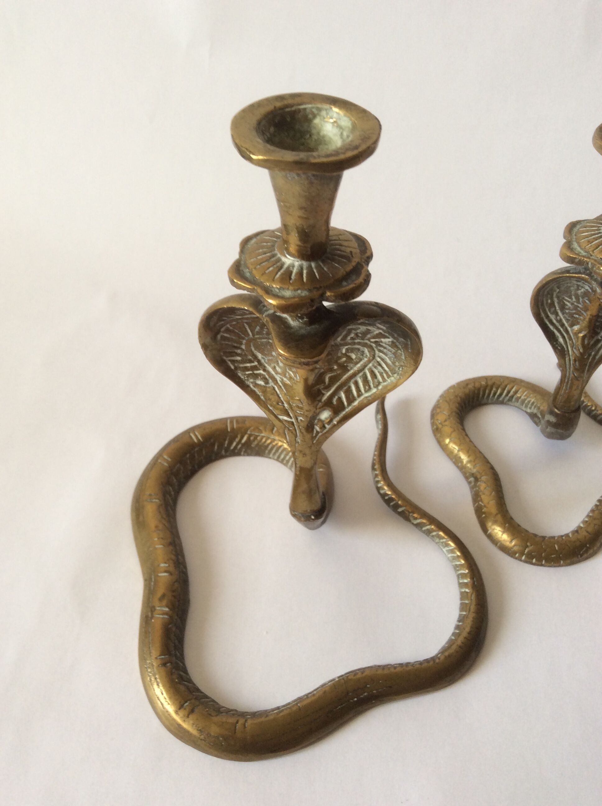 Two zoomorphic brass cobra snake candlesticks
