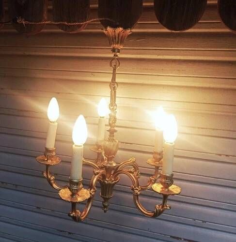 Antique gilded bronze chandelier in Louis XVI style, 5 lights, in working condition.