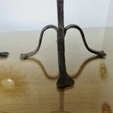 Pair of antique wrought iron candlesticks
