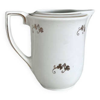 Vintage half white porcelain milk jug l'Amandinoise with golden floral patterns and edging