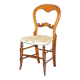 Victorian walnut dressing table chair from around 1880 with a medallion on the backrest.