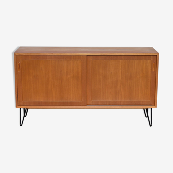 Teak sideboard with sliding doors by Poul Hundevad