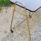 Side table of the 60s mahogany and gold metal range discs