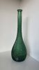 Very large vintage green glass bottle with a diamond point design.
