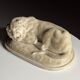 Marble sculpture of a reclining lion
