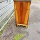 Small English chest of drawers with a folding top.