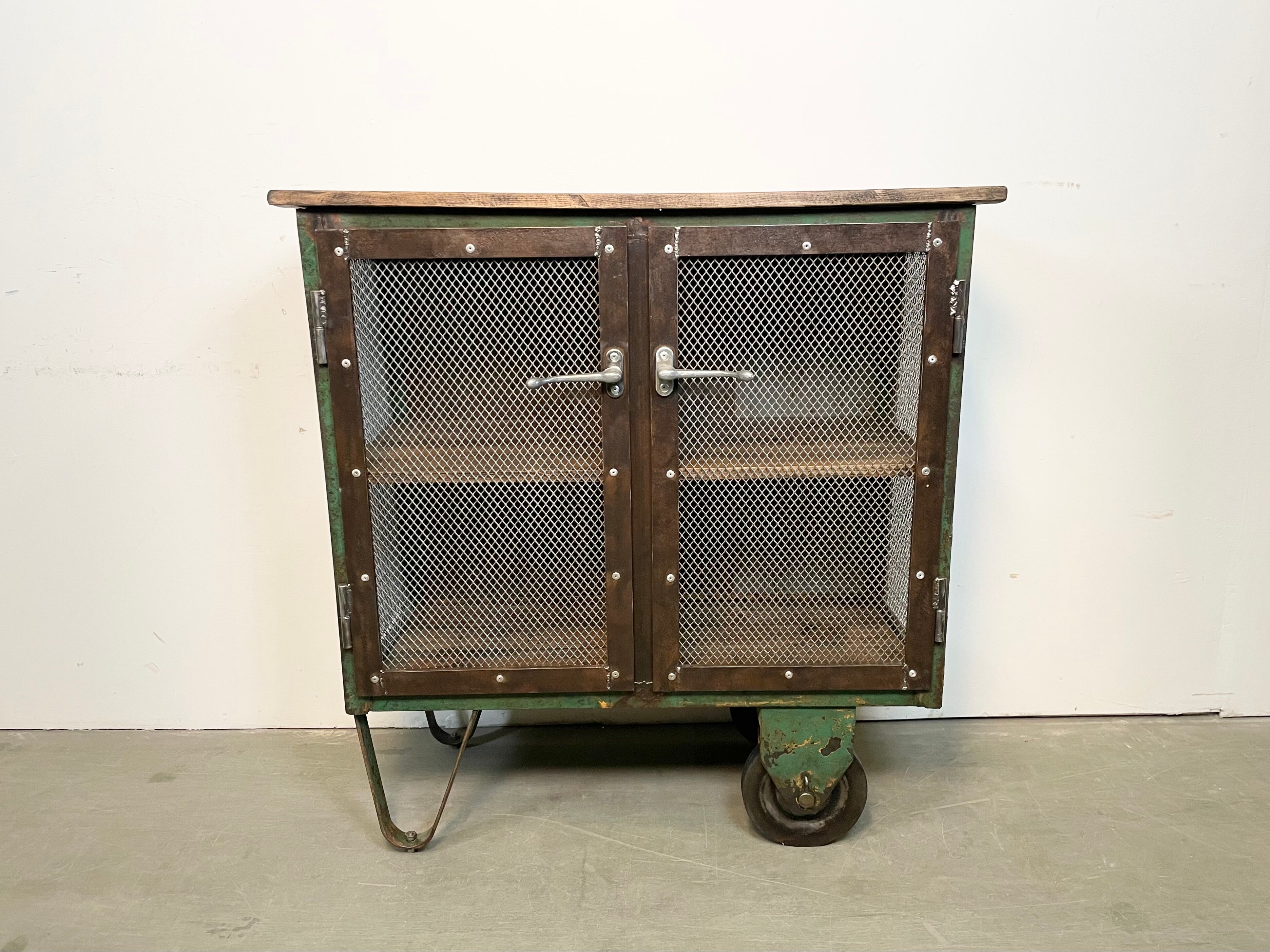 Industrial Iron Cabinet with Mesh Doors on Wheels, 1960s