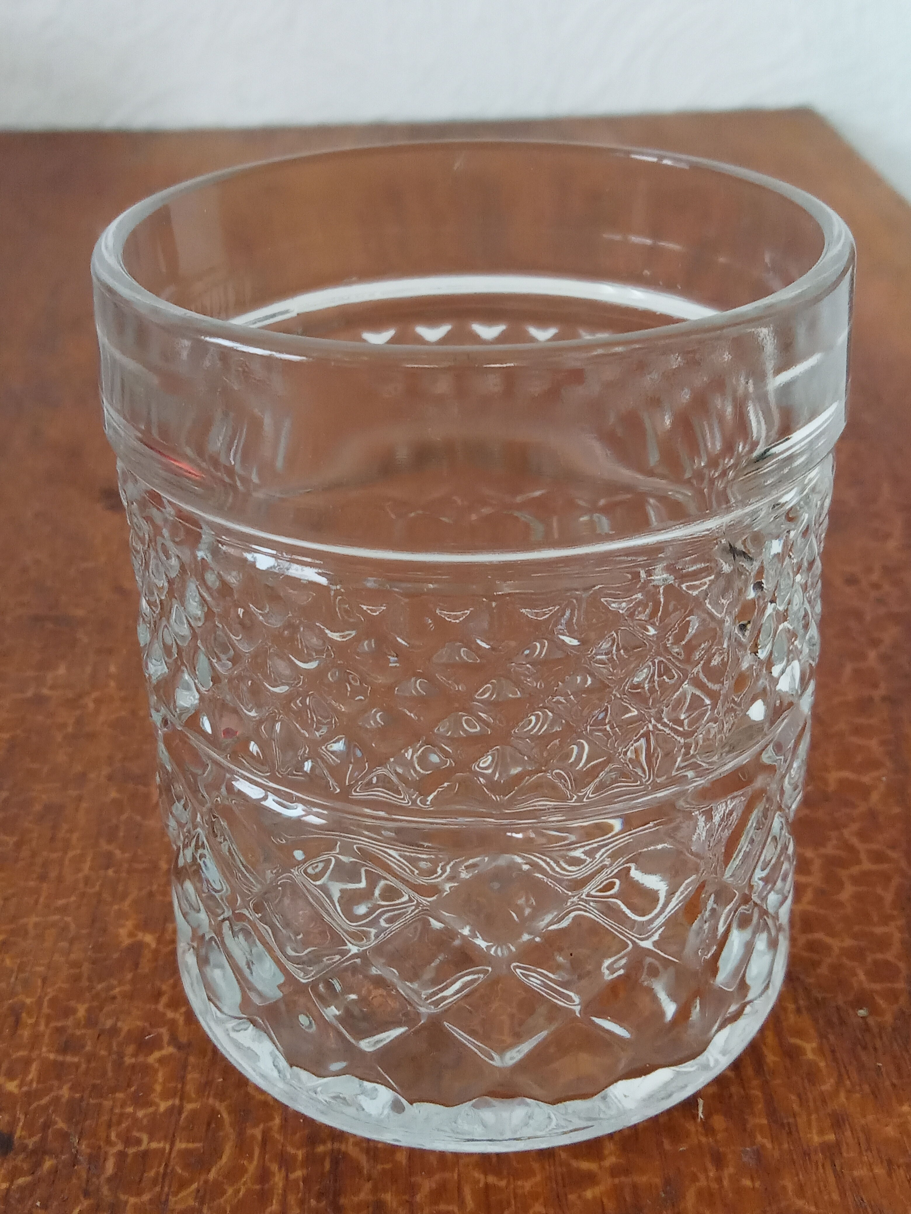 Four whiskey glasses