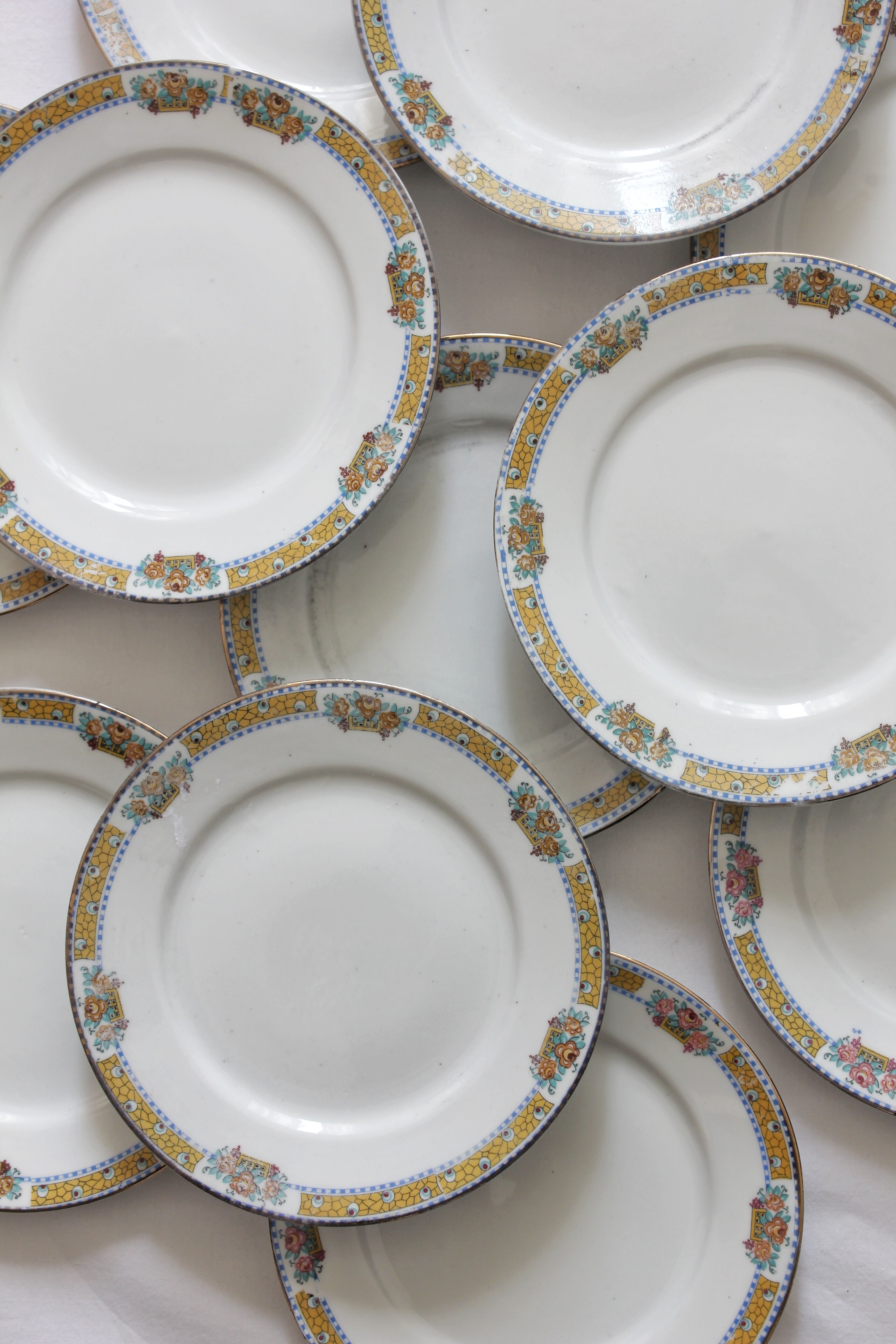 12 vintage porcelain dessert plates