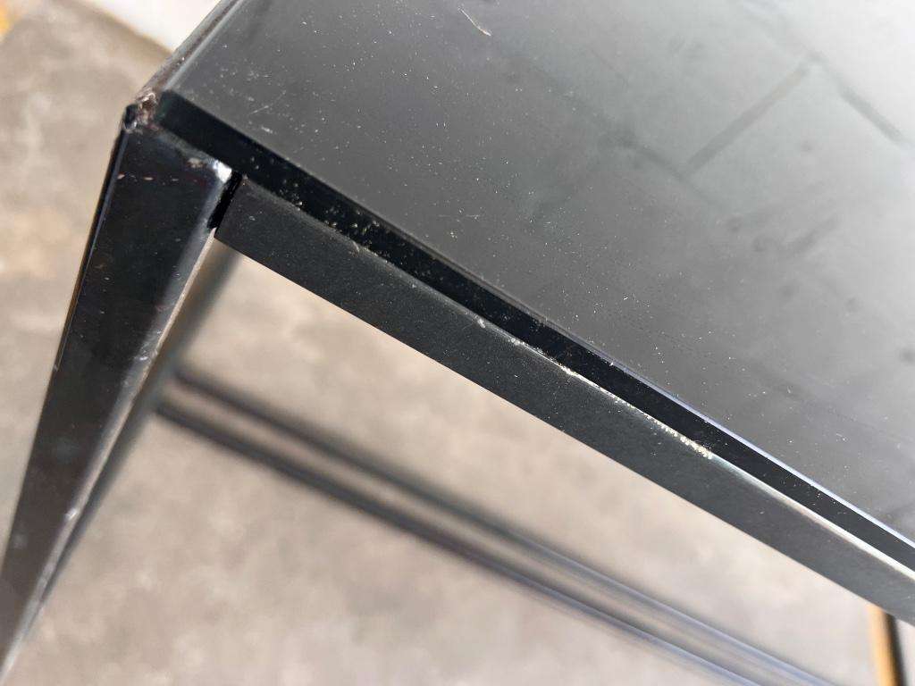 Coffee table in glass and iron