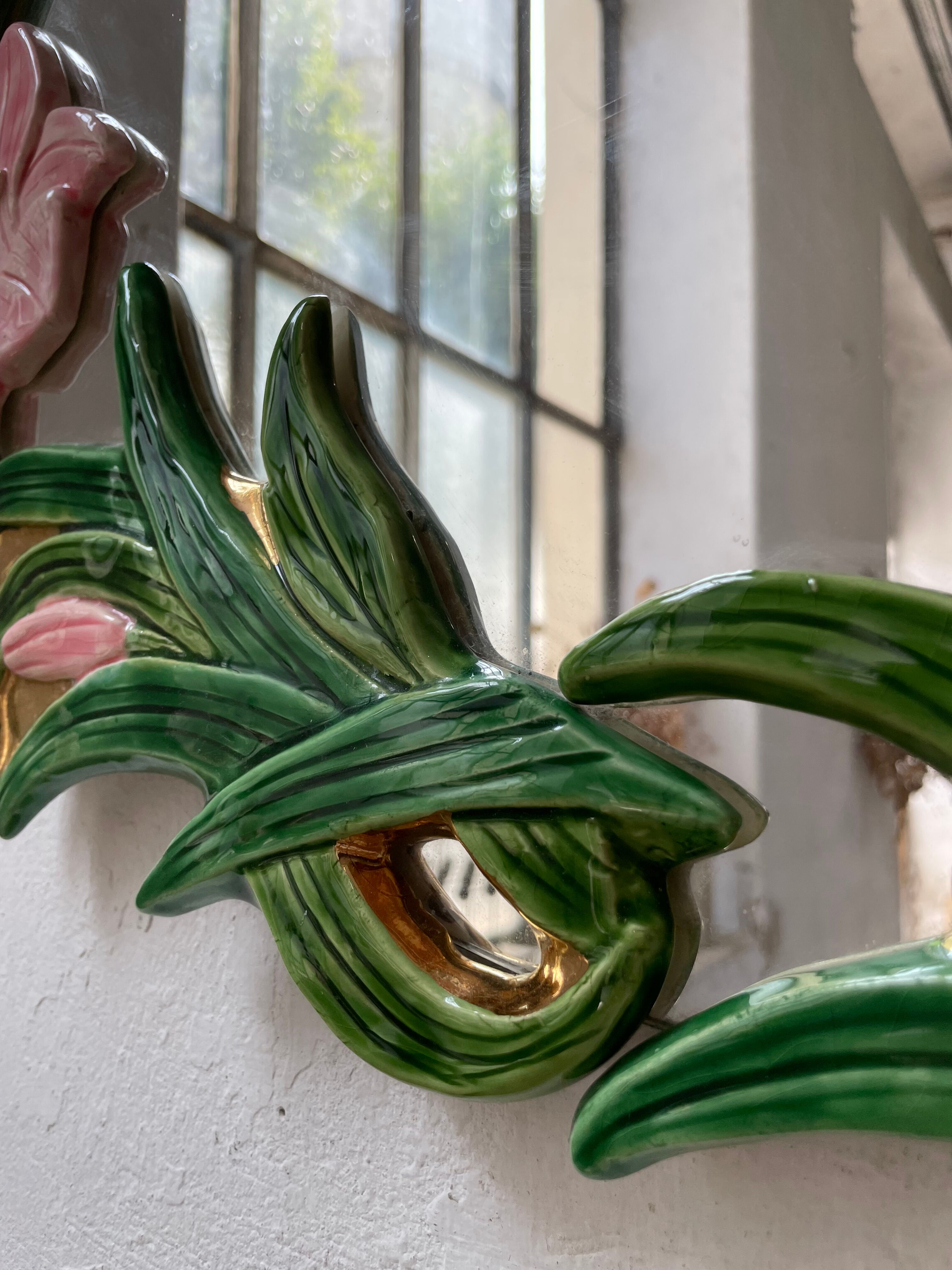 Oval ceramic mirror with flowers