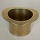 Champagne cooler shaped like a brass top hat.