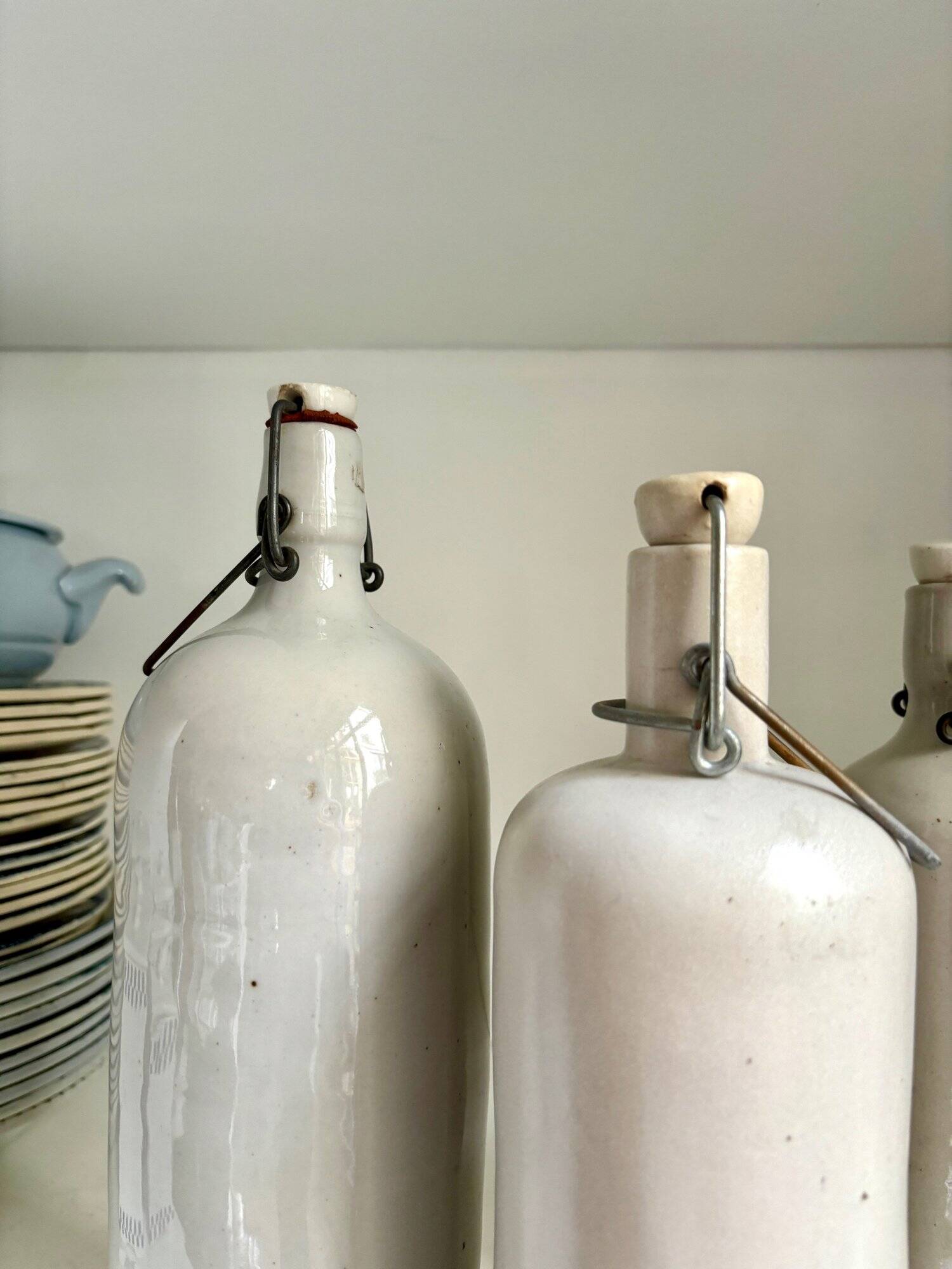 4 beige glazed stoneware bottles