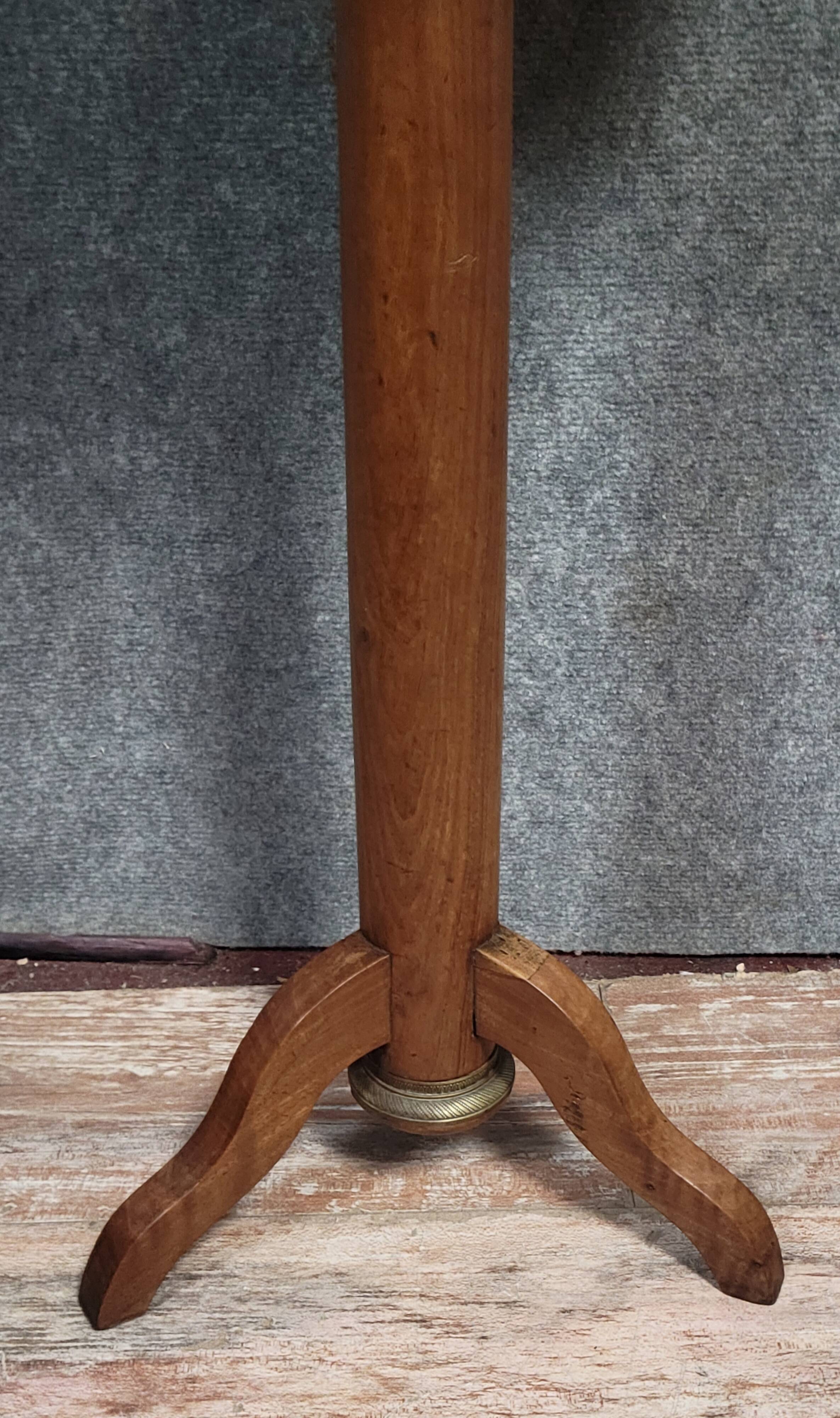 Empire period pedestal table in solid wood and gilt bronze