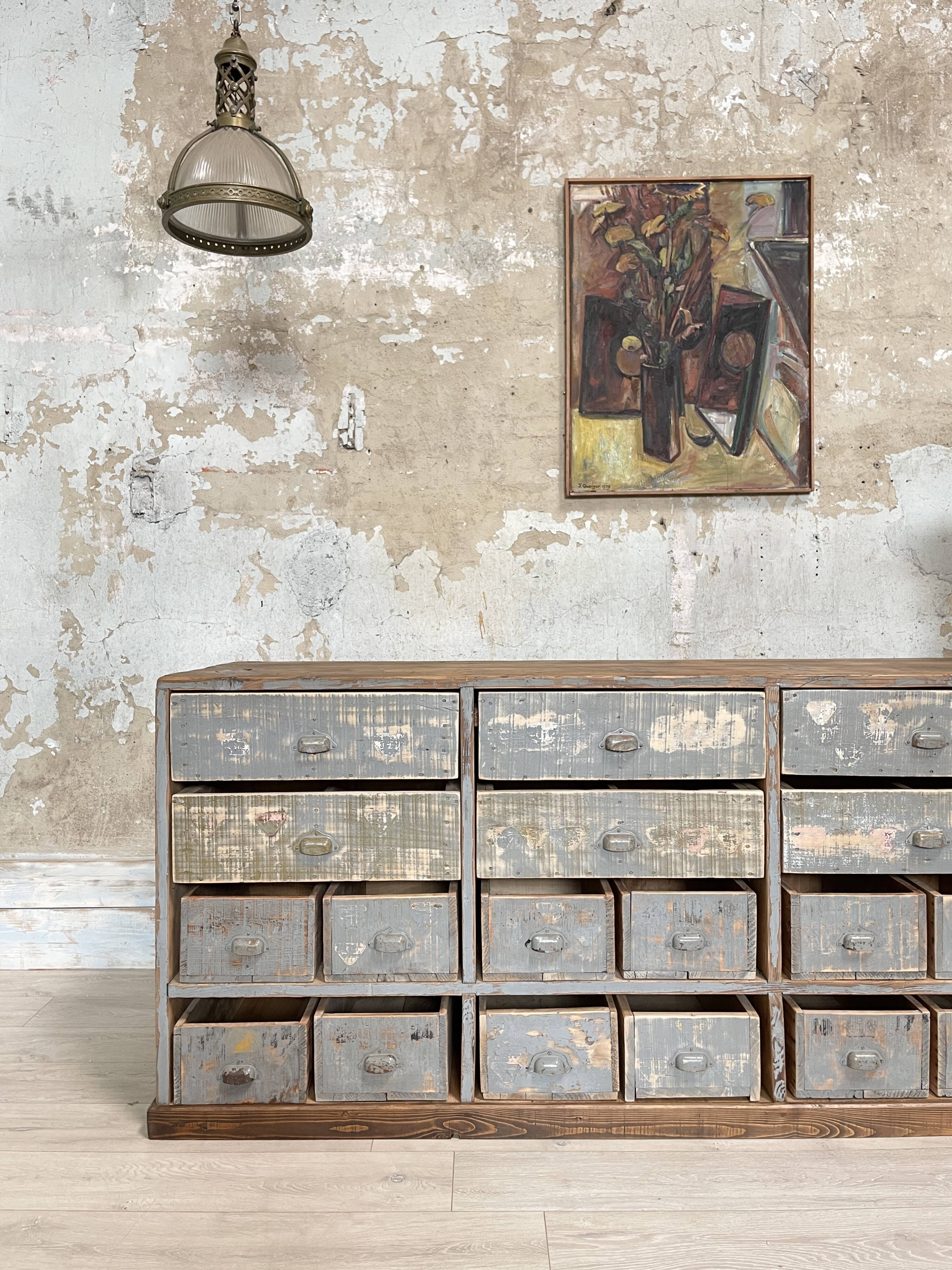Artisanal workshop bank in patinated wood, circa 1950.