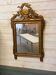 Neoclassical mirror in gilded wood