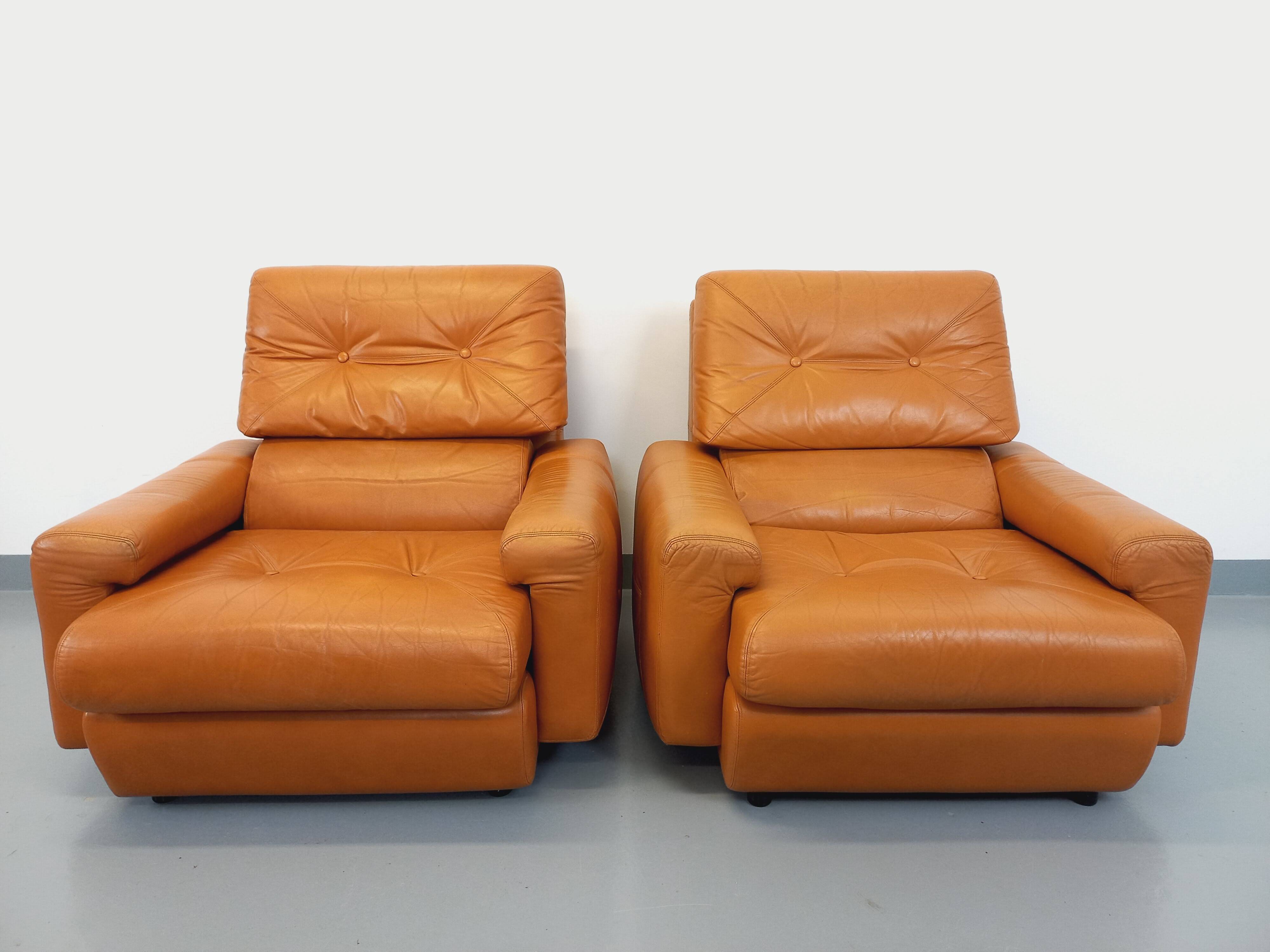 Pair of vintage leather lounge chairs from the 60s and 70s