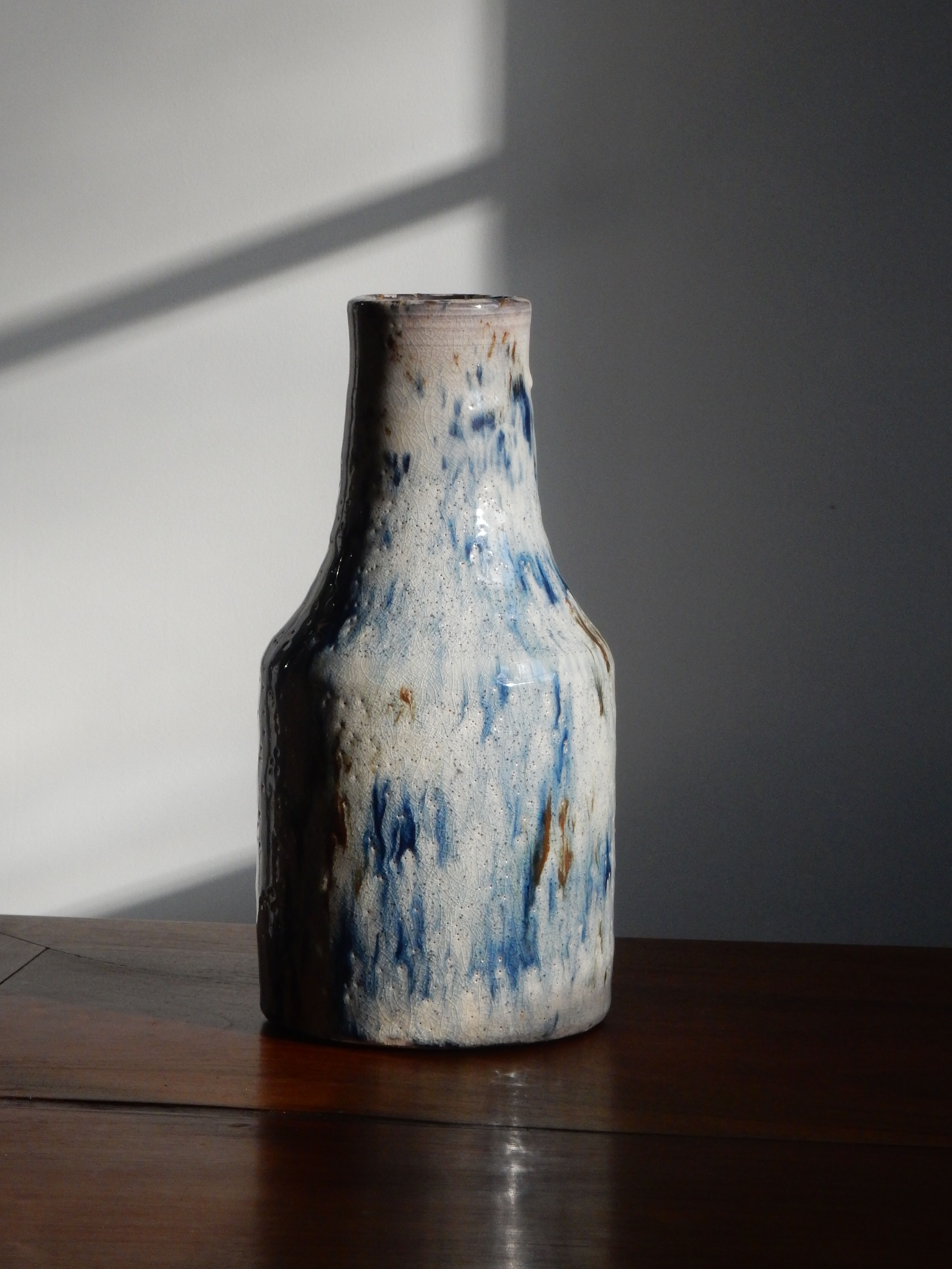 Cracked enamelled sandstone vase
