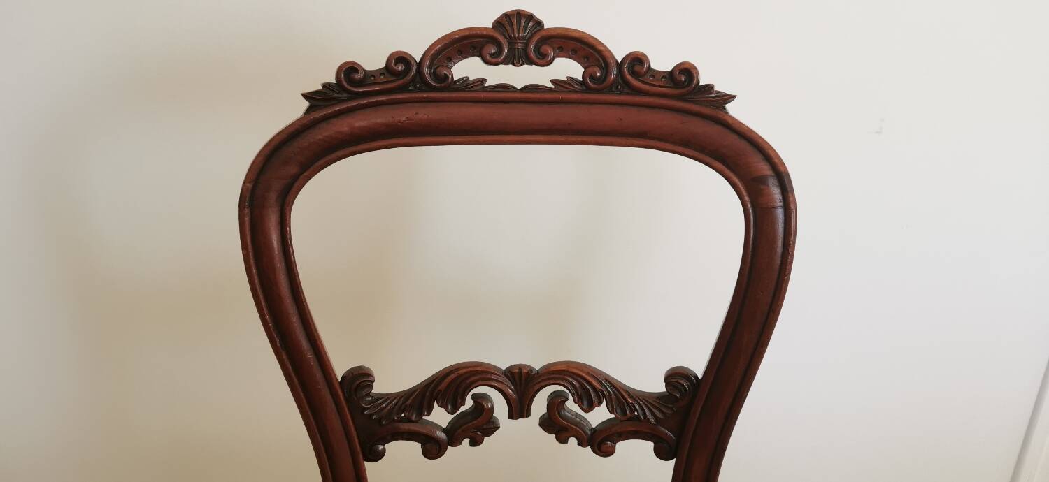 Carved wooden chair and velvet