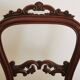 Carved wooden chair and velvet