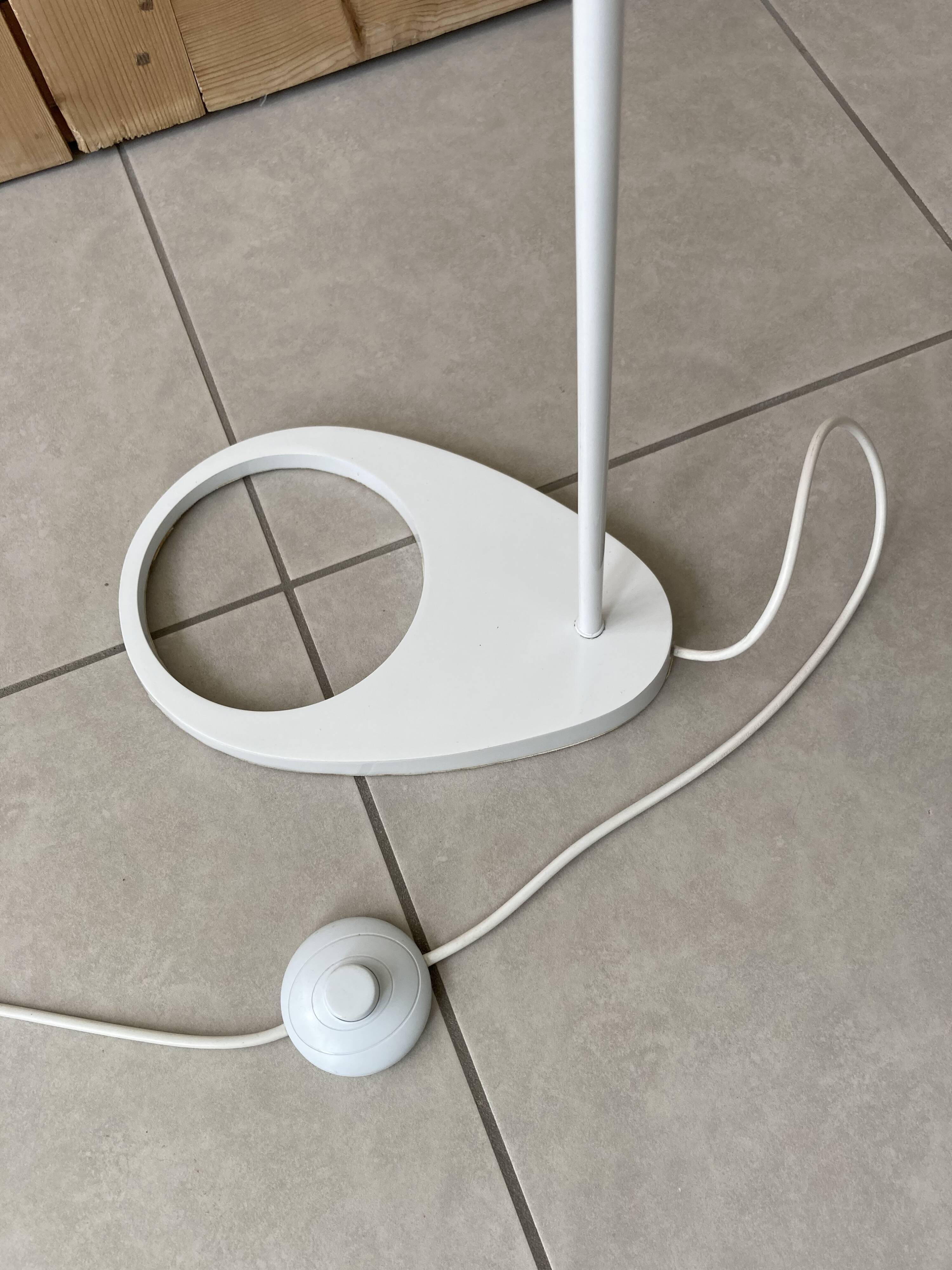 white lacquered metal reading lamp