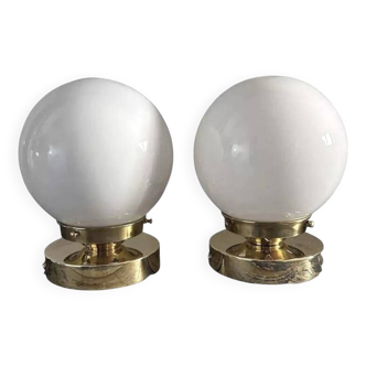 Pair of white opaline globe wall lights