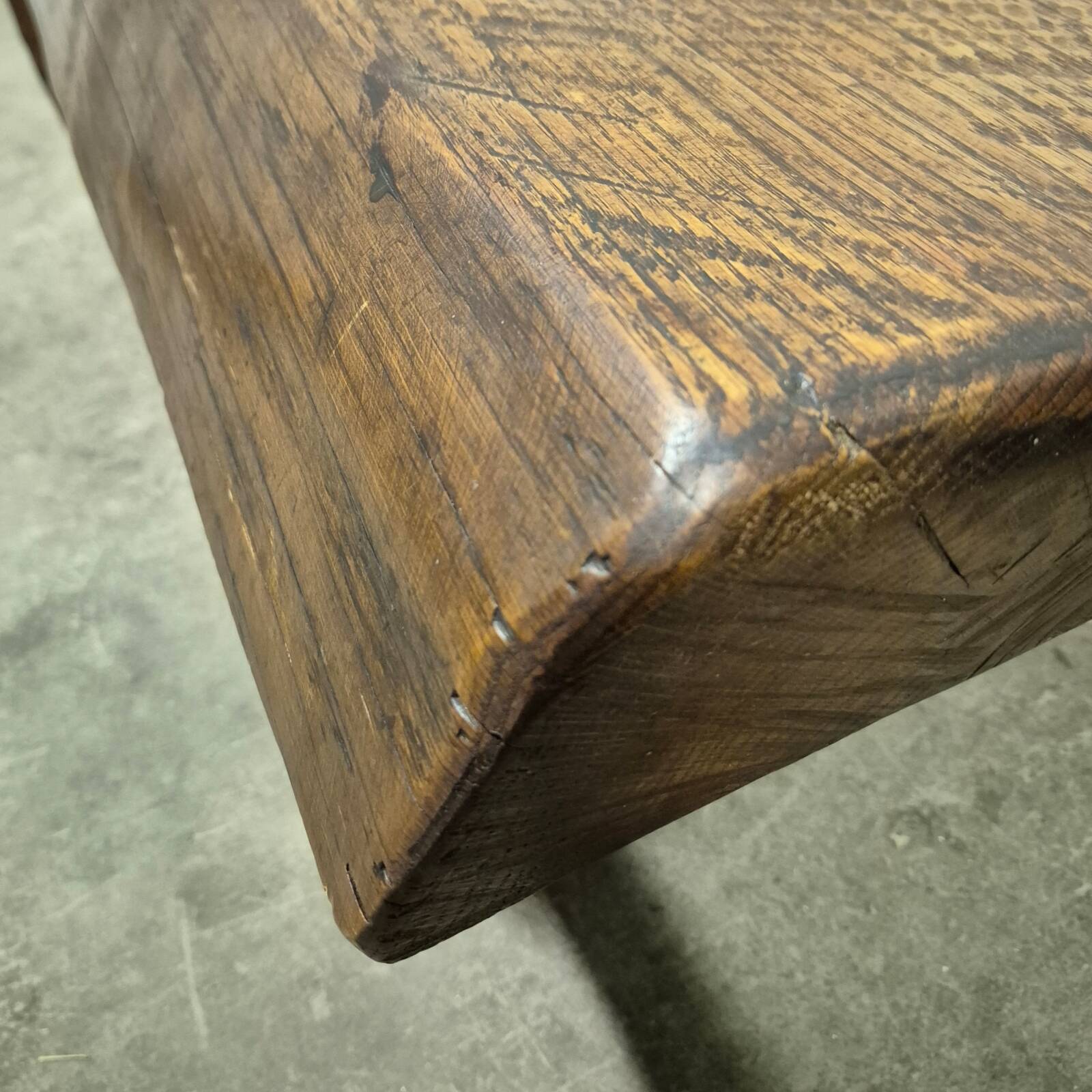 Rustic solid oak coffee table with a one piece top, France 1950s