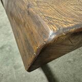 Rustic solid oak coffee table with a one piece top, France 1950s