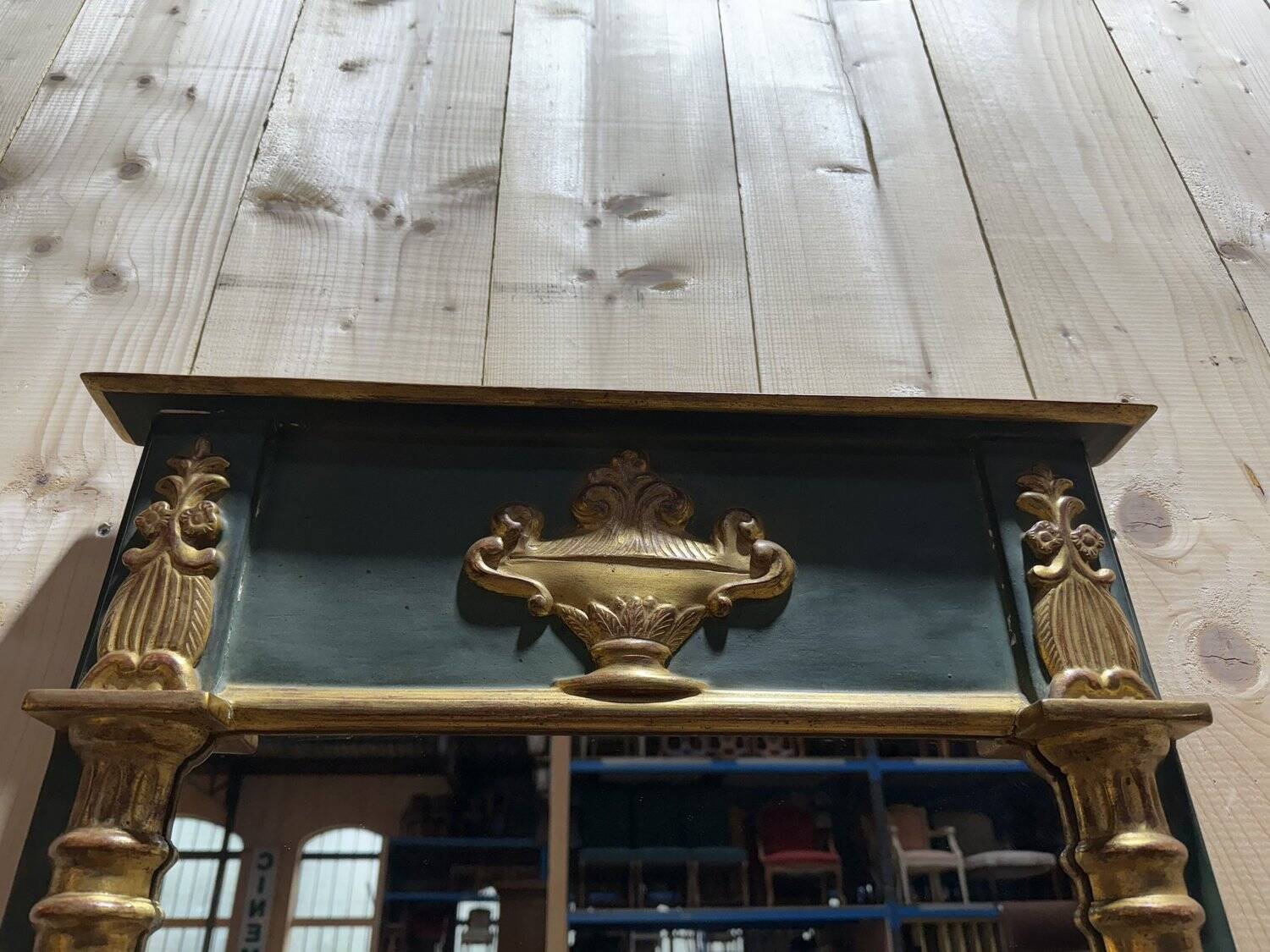 Empire-style mirror in gilded wood