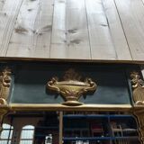 Empire-style mirror in gilded wood