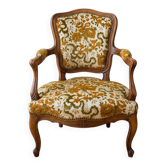 Louis XV armchair in wood and yellow and green floral fabric