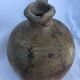 Ancient jug in glazed sandstone
