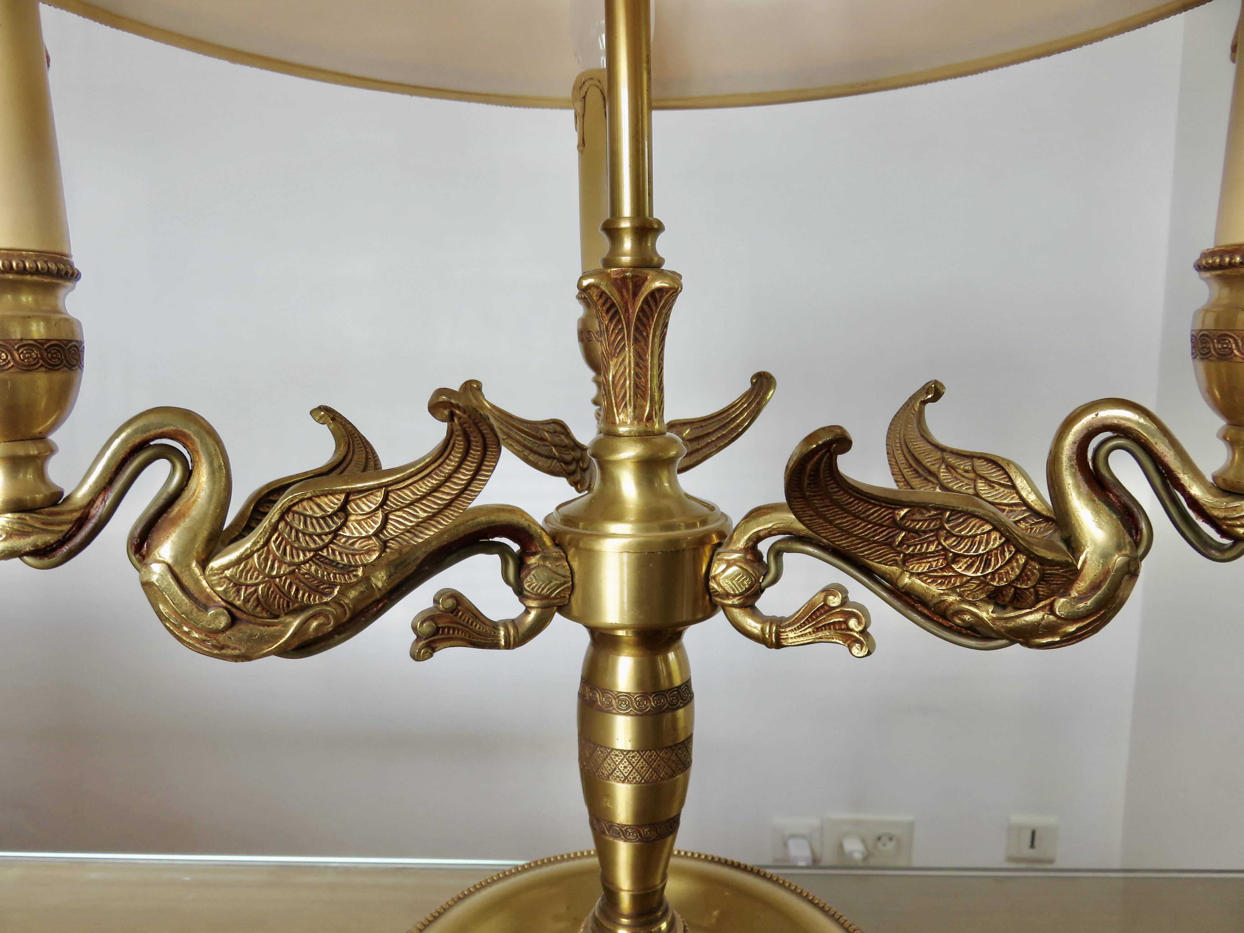 Lucien Gau empire style lamp in solid bronze gilded with bright gold "with swans"