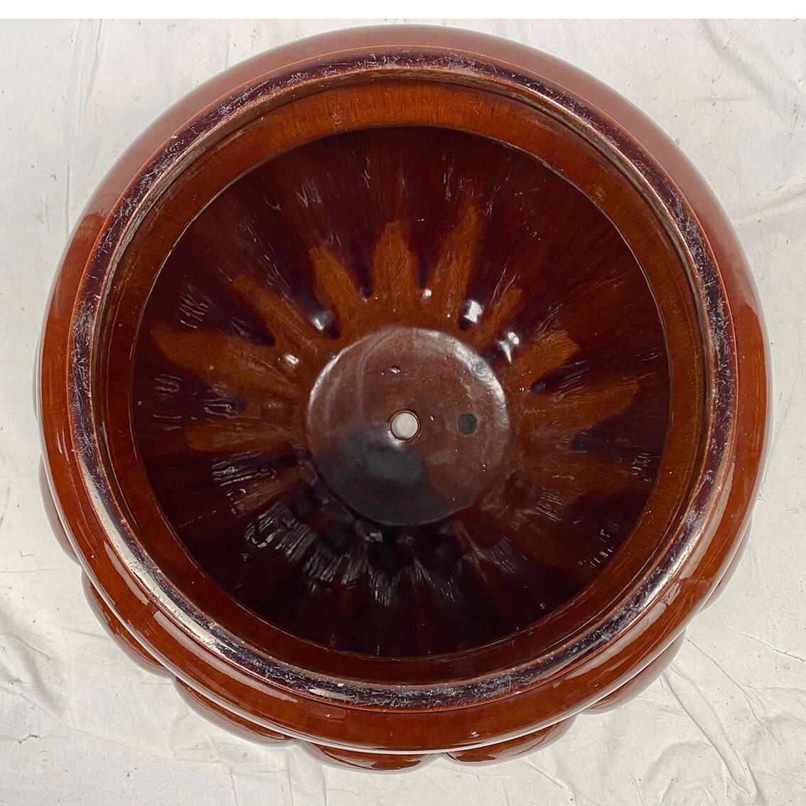 Complete in brown-toned enamelled ceramic, planter on its column