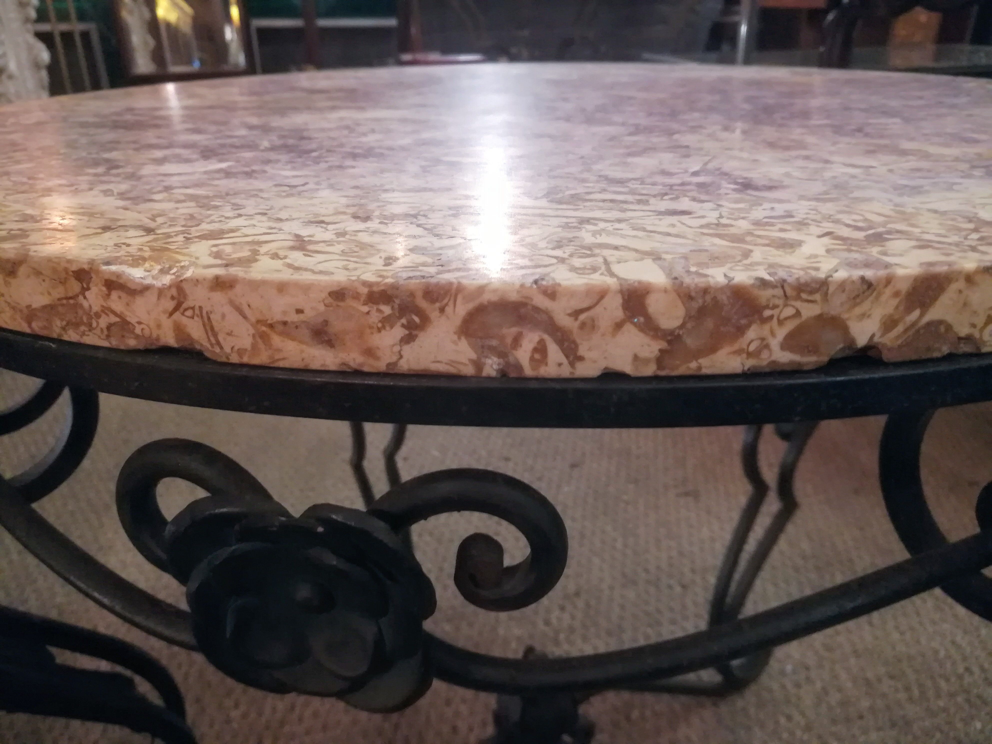 Wrought iron and marble coffee table