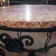 Wrought iron and marble coffee table