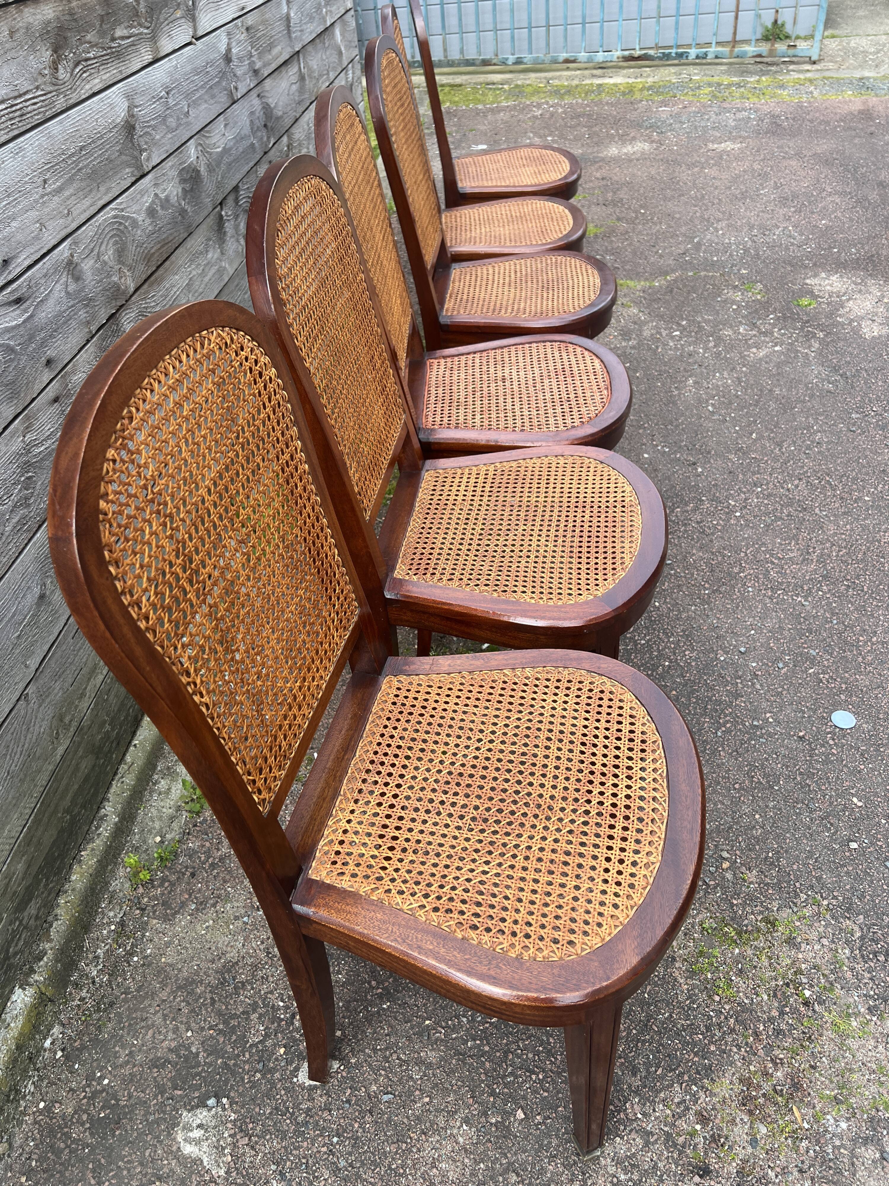 Six caned mahogany chairs, Art Deco, 20th century.