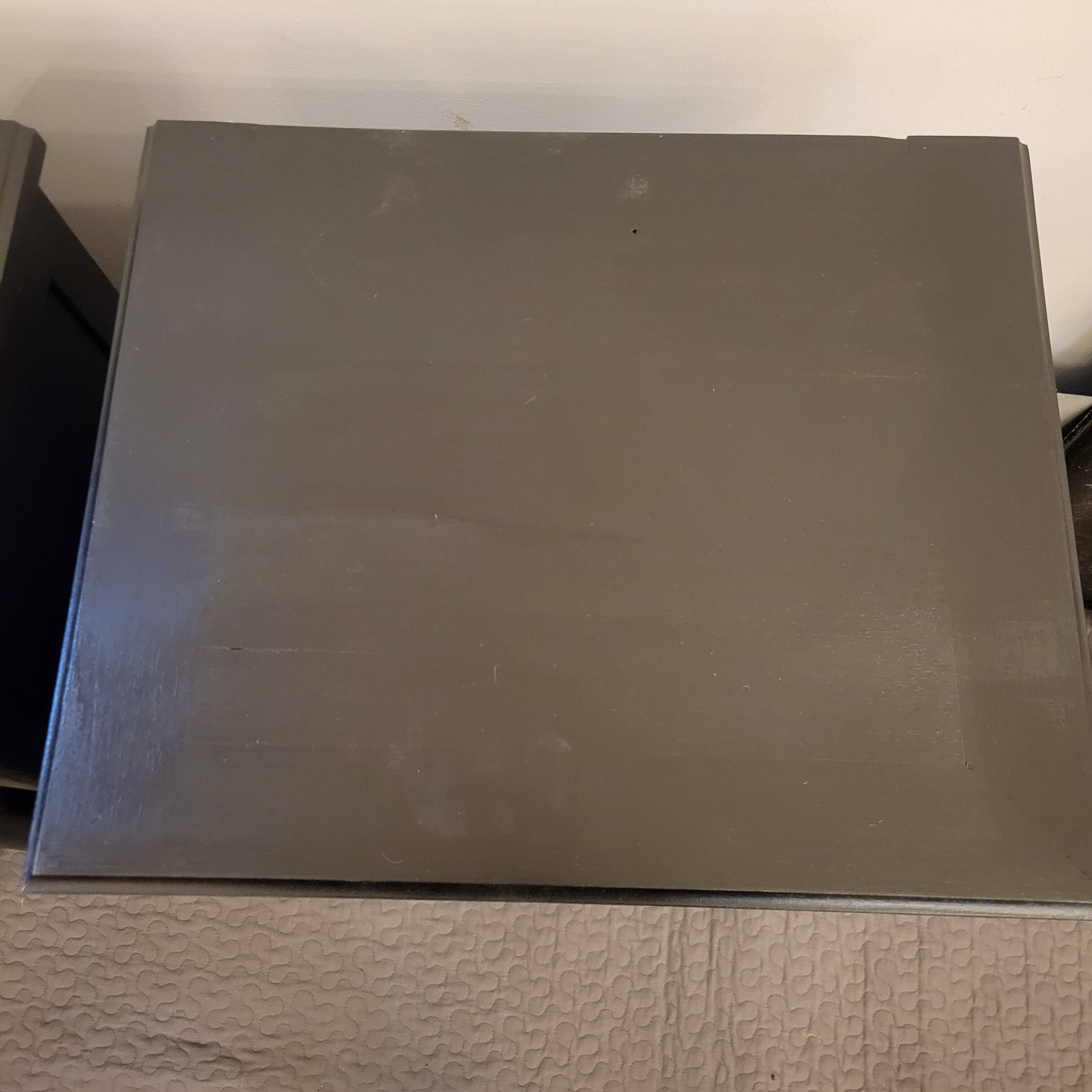 Pair of black patina bedside tables