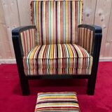 Art Deco armchair in multicolored striped fabric and its footrest