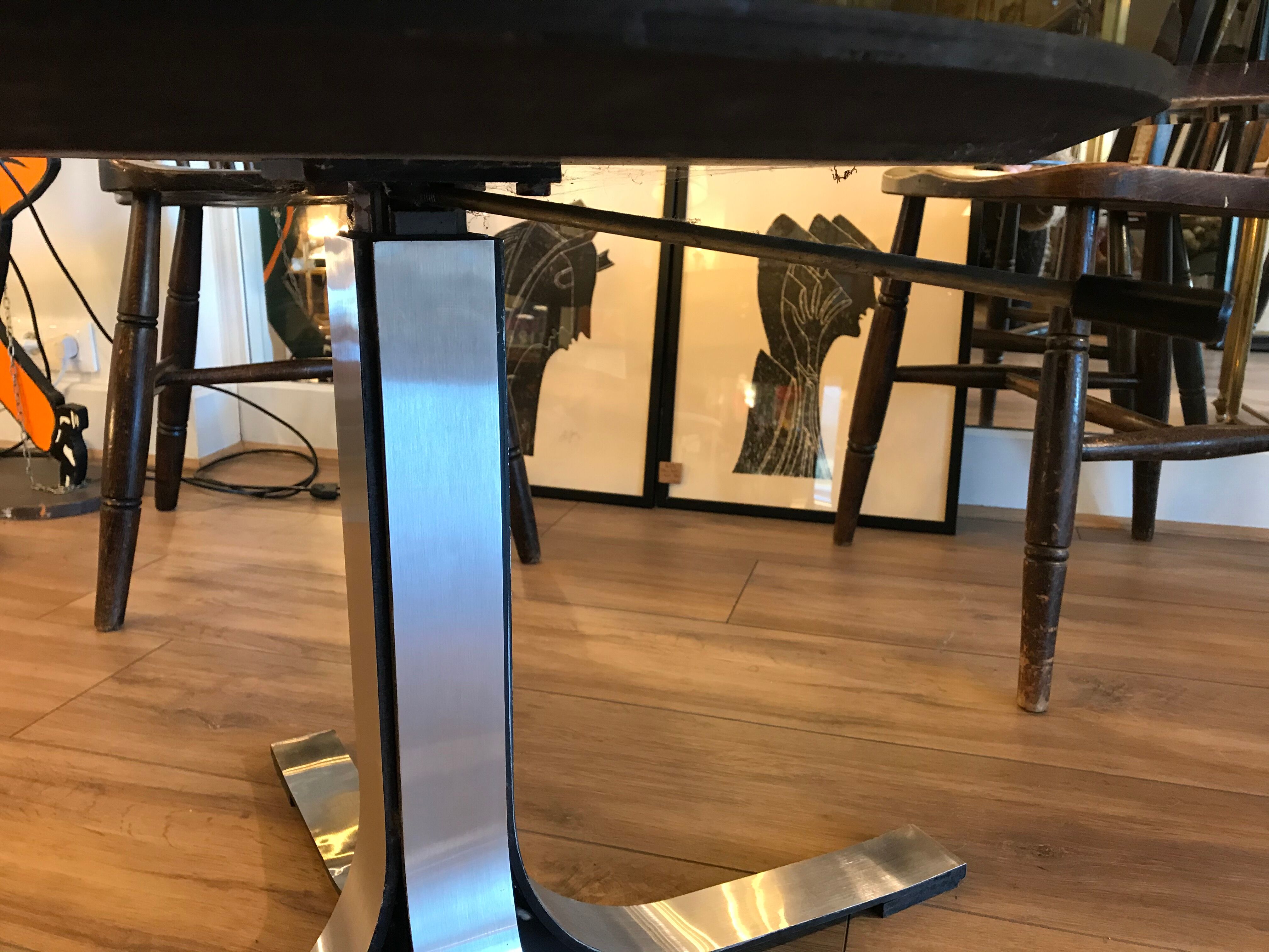 Smoky glass liftable round table