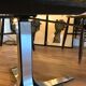 Smoky glass liftable round table